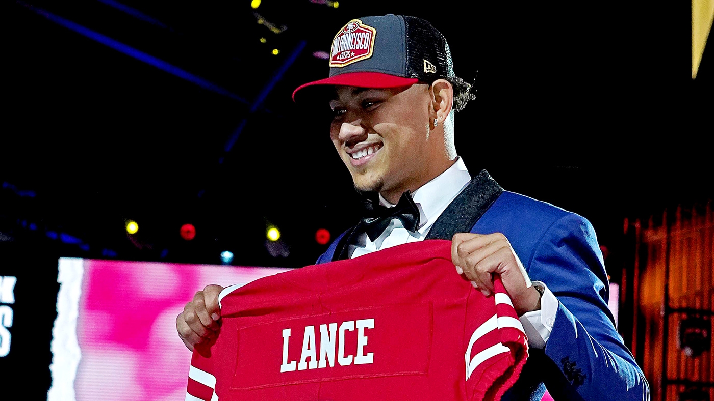 Trey Lance wearing a Dodgers hat 